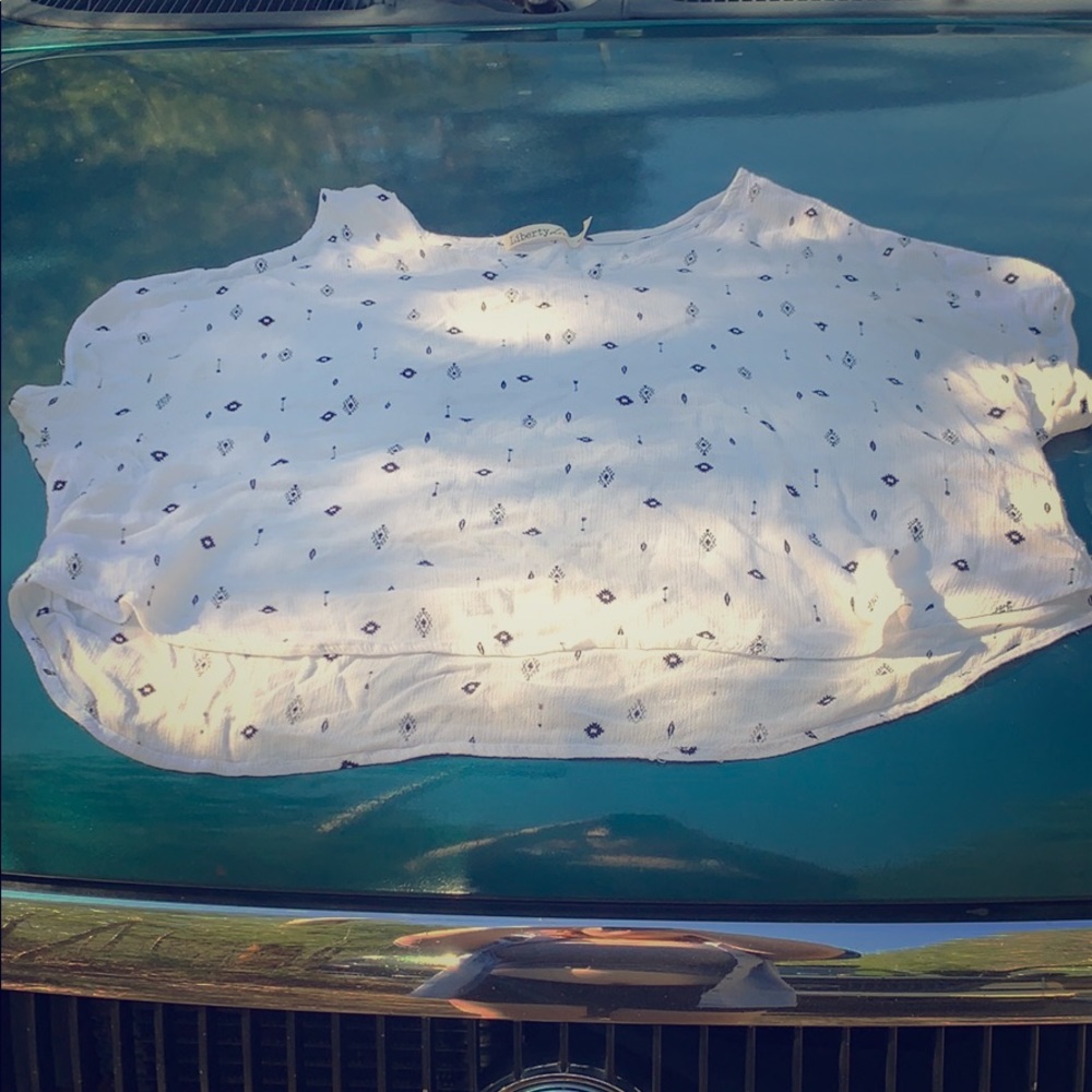 This is a t-shirt, shoulders exposed,